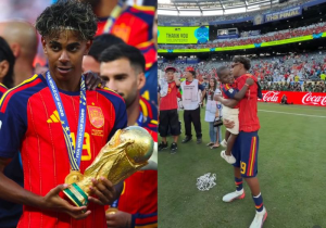 Lamine Yamal comemora o título de campeão da Copa do Mundo pela Espanha com a taça na mão e o irmãozinho Keyne no colo. Lindo de se ver - Fotos: CazéTV/Barcelona